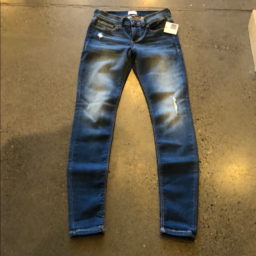 Low rise blue sneak peak jeans